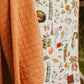 The Witch’s Greenhouse Quilted Bamboo Blanket